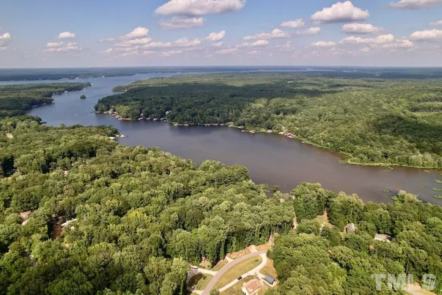 a view of a lake with a yard