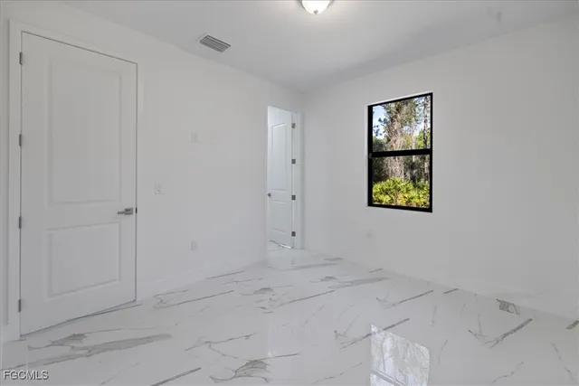a bathroom with a sink and vanity