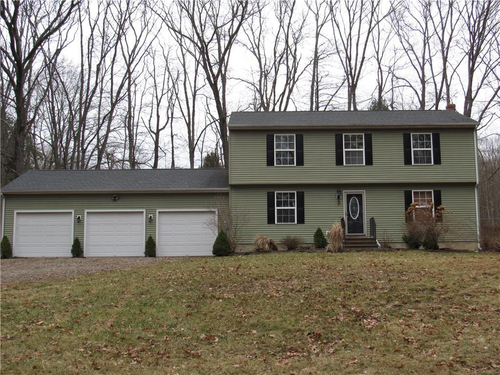 429 Beaver Hill Road Windham, CT 06256 - Photo 1 of 1 a front view of a house with a yard