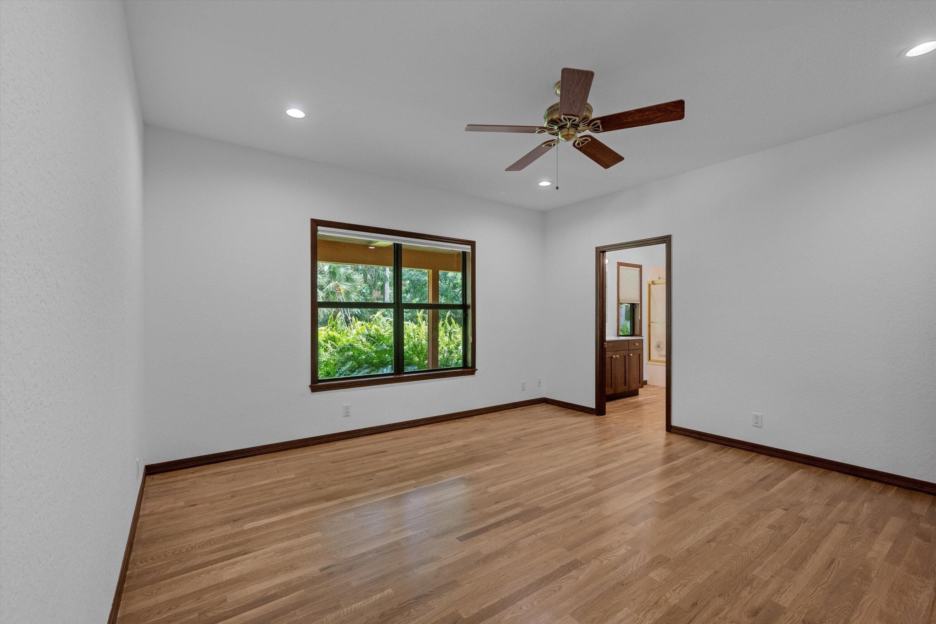 1255 B Road Loxahatchee Groves, FL 33470 - Photo 36 of 63 Second Primary Bedroom