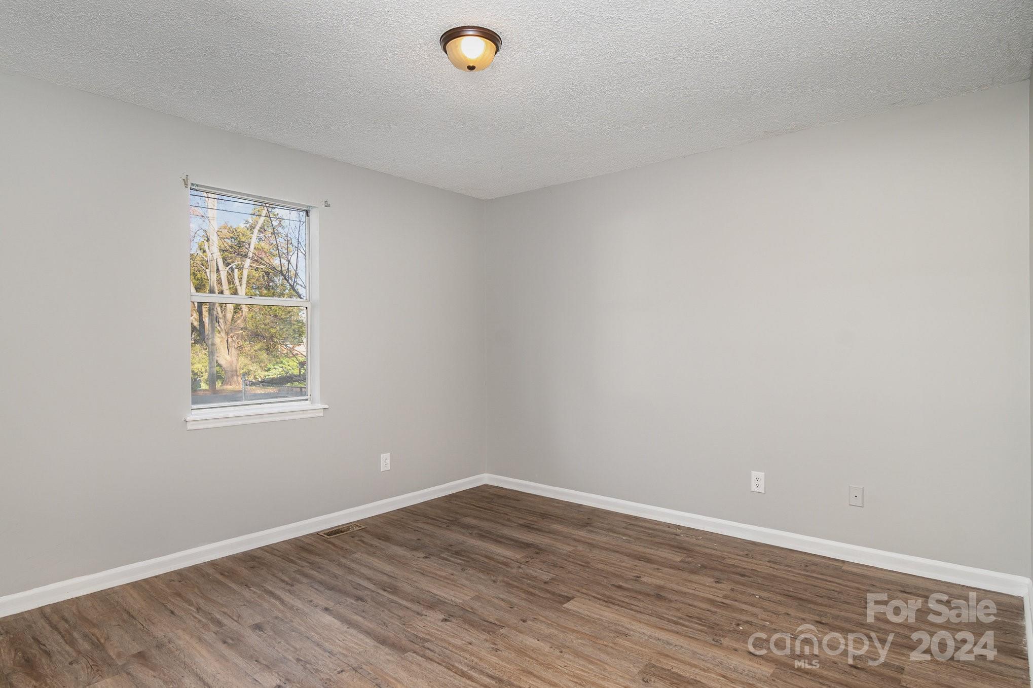 312 Moore Drive Lexington, NC 27292 - Photo 15 of 19 an empty room with a window