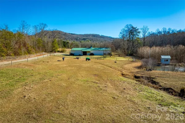 a view of backyard with green space