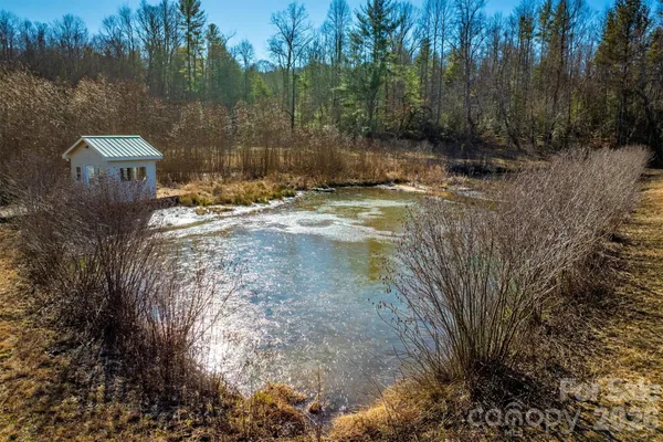 a view of a town with mountains in the background