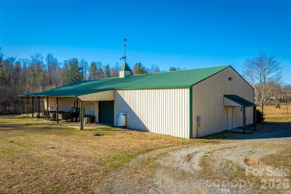 a view of swimming pool with seating area