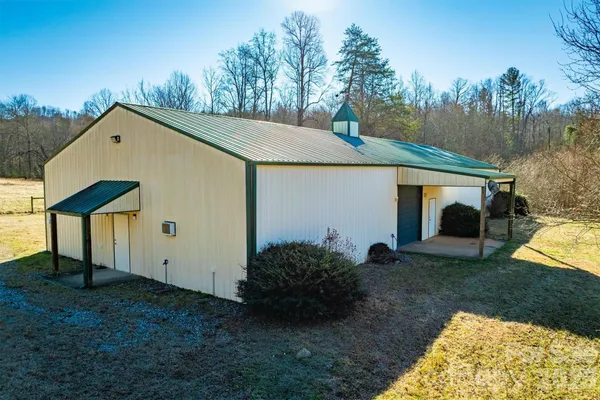 a view of a lake with a yard