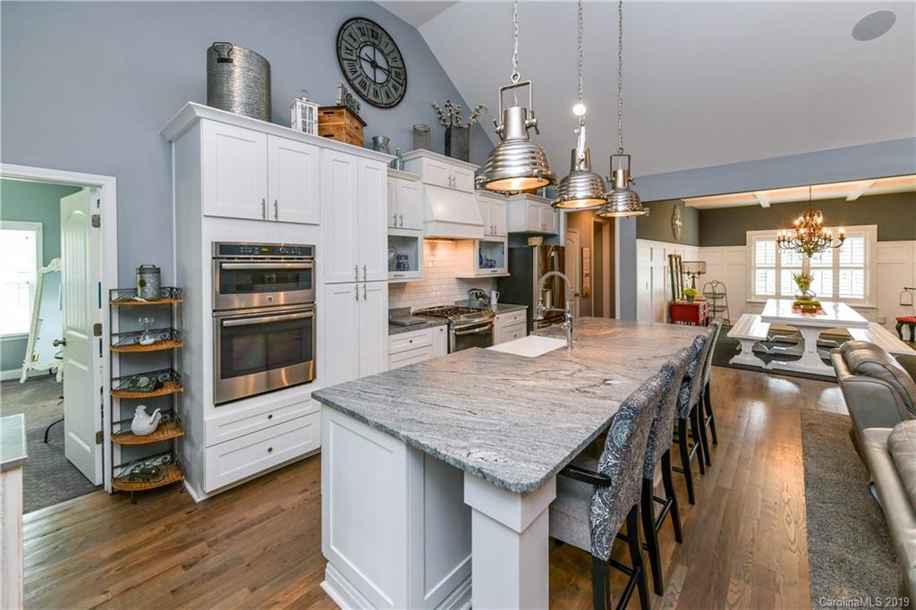 211 Scottish Highland Road Clover, SC 29710 - Photo 14 of 36 a open kitchen with stainless steel appliances granite countertop a stove and refrigerator