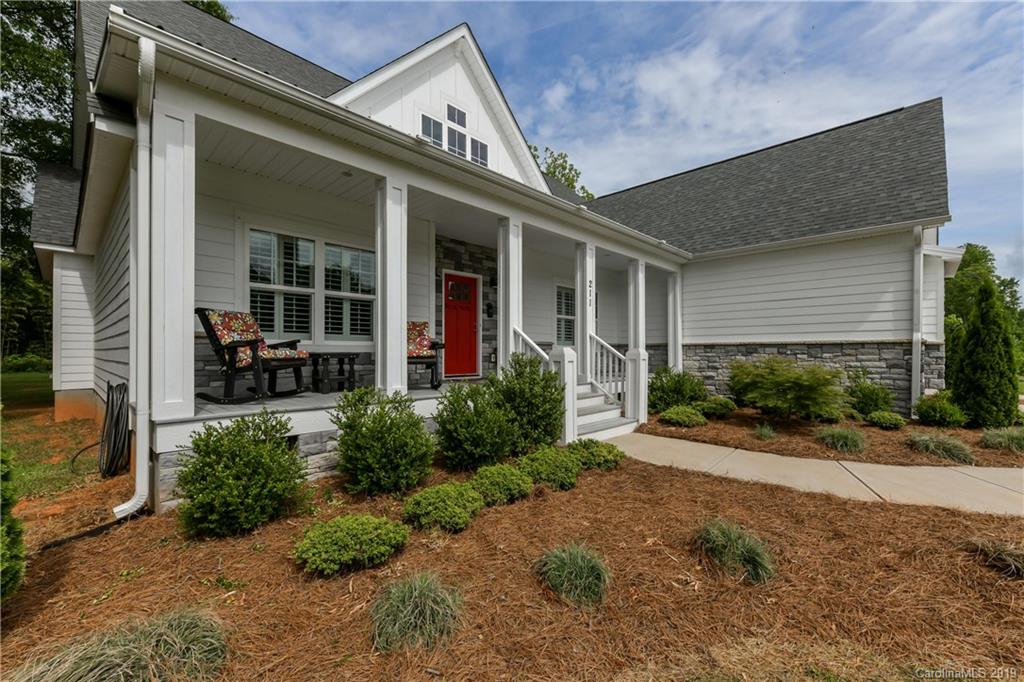 211 Scottish Highland Road Clover, SC 29710 - Photo 3 of 36 front view of a brick house with a yard