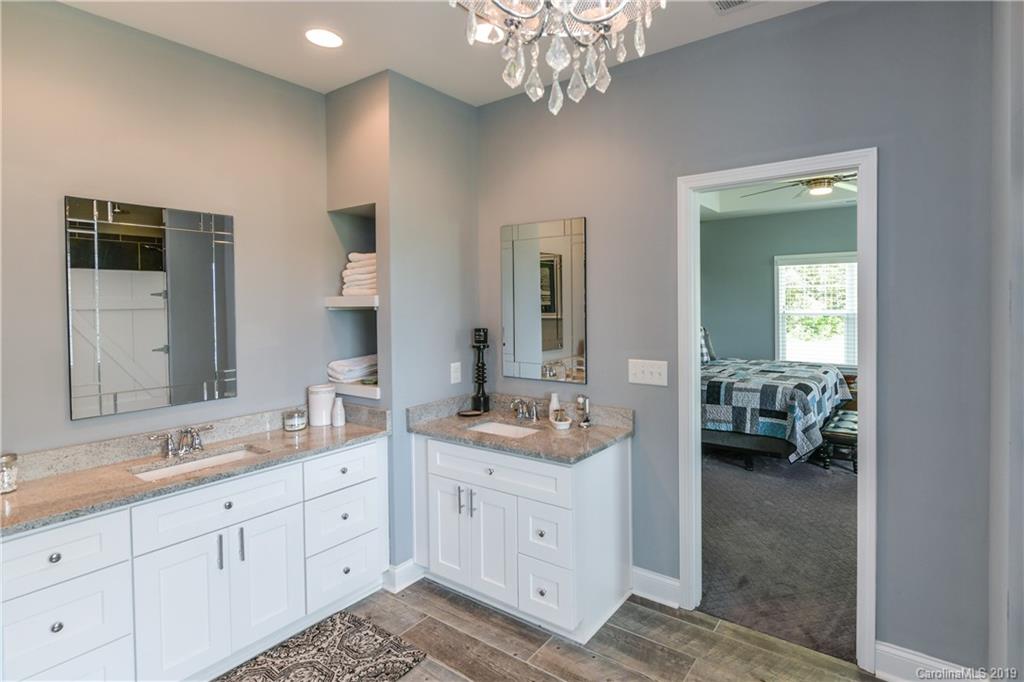 211 Scottish Highland Road Clover, SC 29710 - Photo 21 of 36 a en suite bathroom with double sink and a mirror