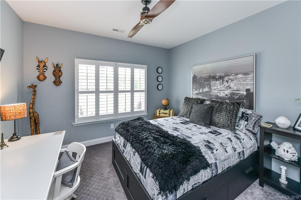 211 Scottish Highland Road Clover, SC 29710 - Photo 22 of 36 a bedroom with a bed and a window