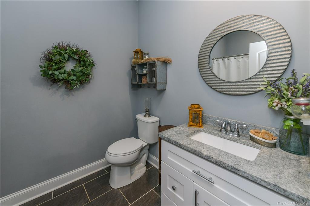 211 Scottish Highland Road Clover, SC 29710 - Photo 23 of 36 a bathroom with a toilet and a sink