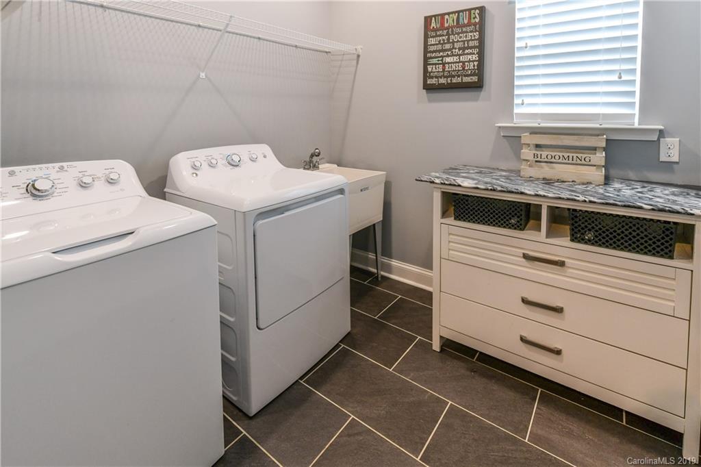 211 Scottish Highland Road Clover, SC 29710 - Photo 26 of 36 a utility room with dryer and washer