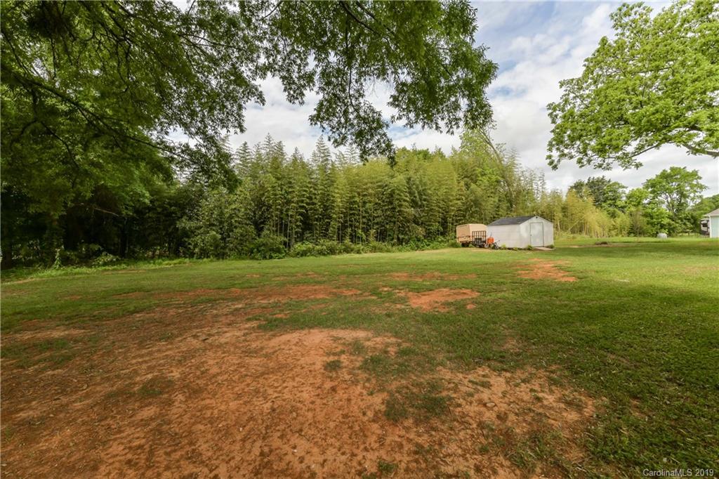 211 Scottish Highland Road Clover, SC 29710 - Photo 34 of 36 a view of a field with trees around
