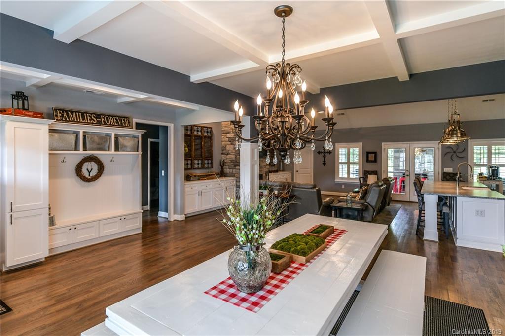 211 Scottish Highland Road Clover, SC 29710 - Photo 9 of 36 a living room with furniture and a chandelier