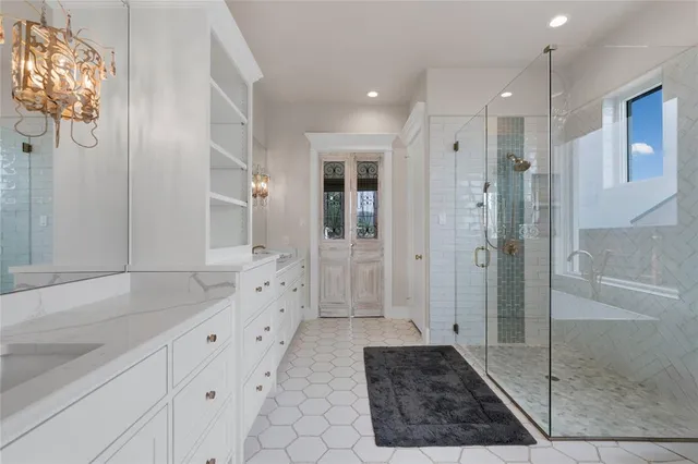 a bathroom with a shower and a sink