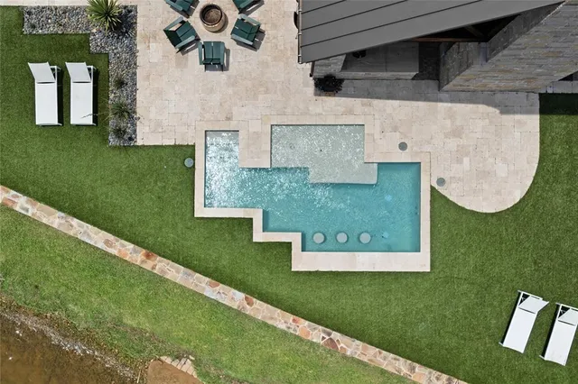 an aerial view of a house having yard