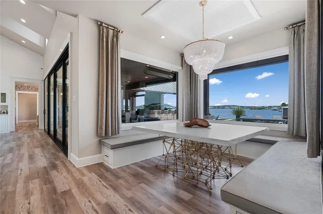 a view of a room with wooden floor and staircase