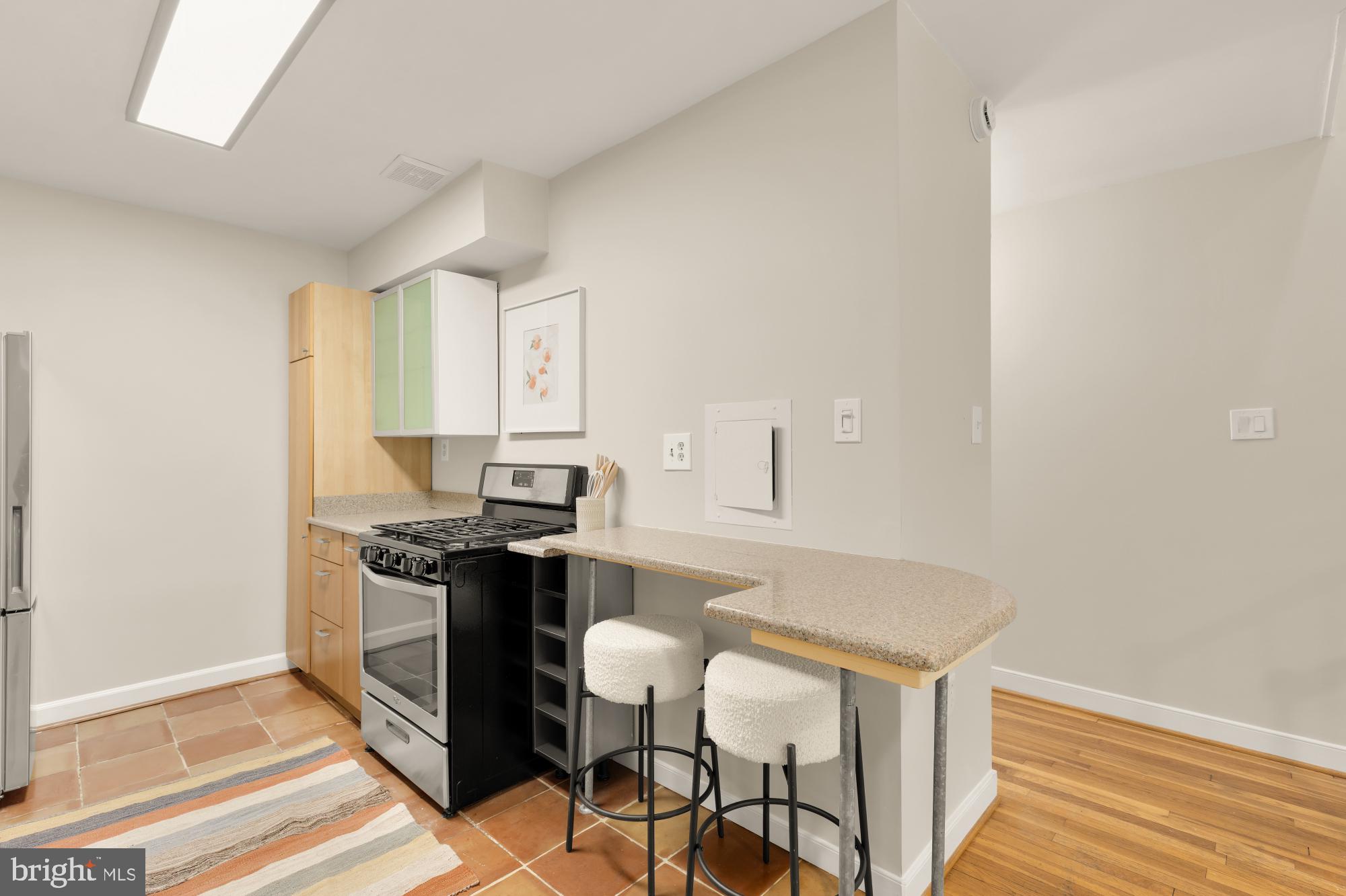 337 N Street Southwest Washington, DC 20024 - Photo 10 of 28 a living room with stainless steel appliances granite countertop a sink and cabinets