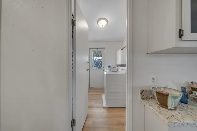 a bathroom with a sink and mirror