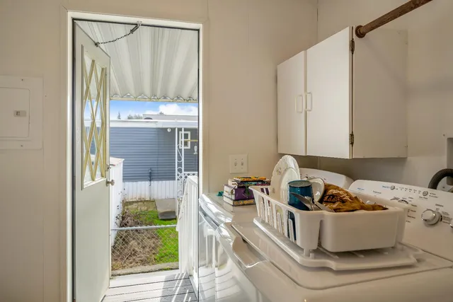 a view of a house with a flower garden