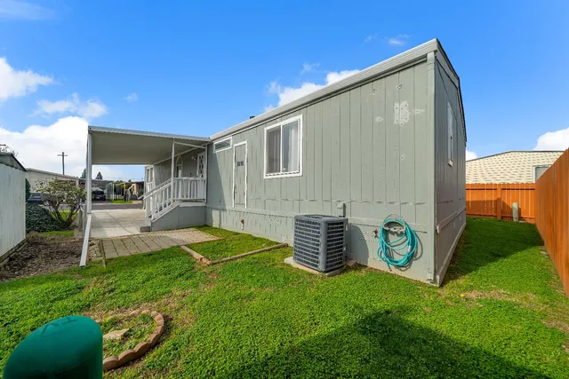a backyard of a house with lots of green space