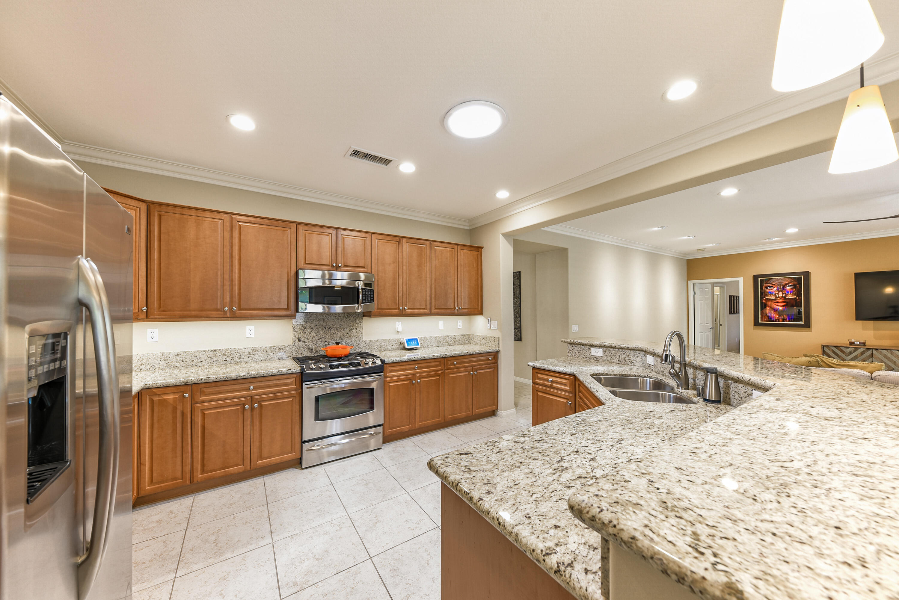 81190 Corte Del Olma Indio, CA 92203 - Photo 13 of 47 a kitchen with a stove sink and cabinets