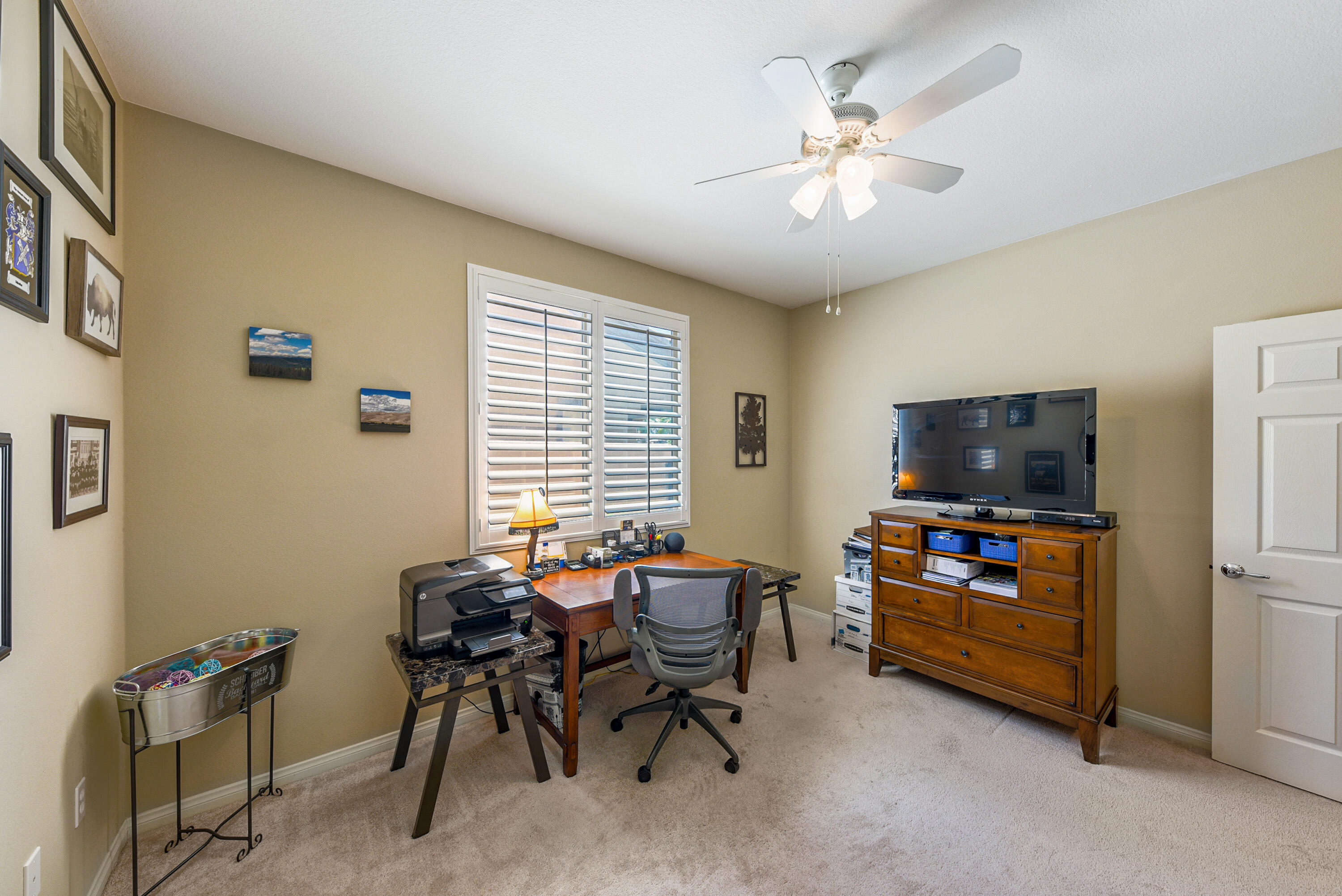 81190 Corte Del Olma Indio, CA 92203 - Photo 19 of 47 a living room with furniture and a flat screen tv