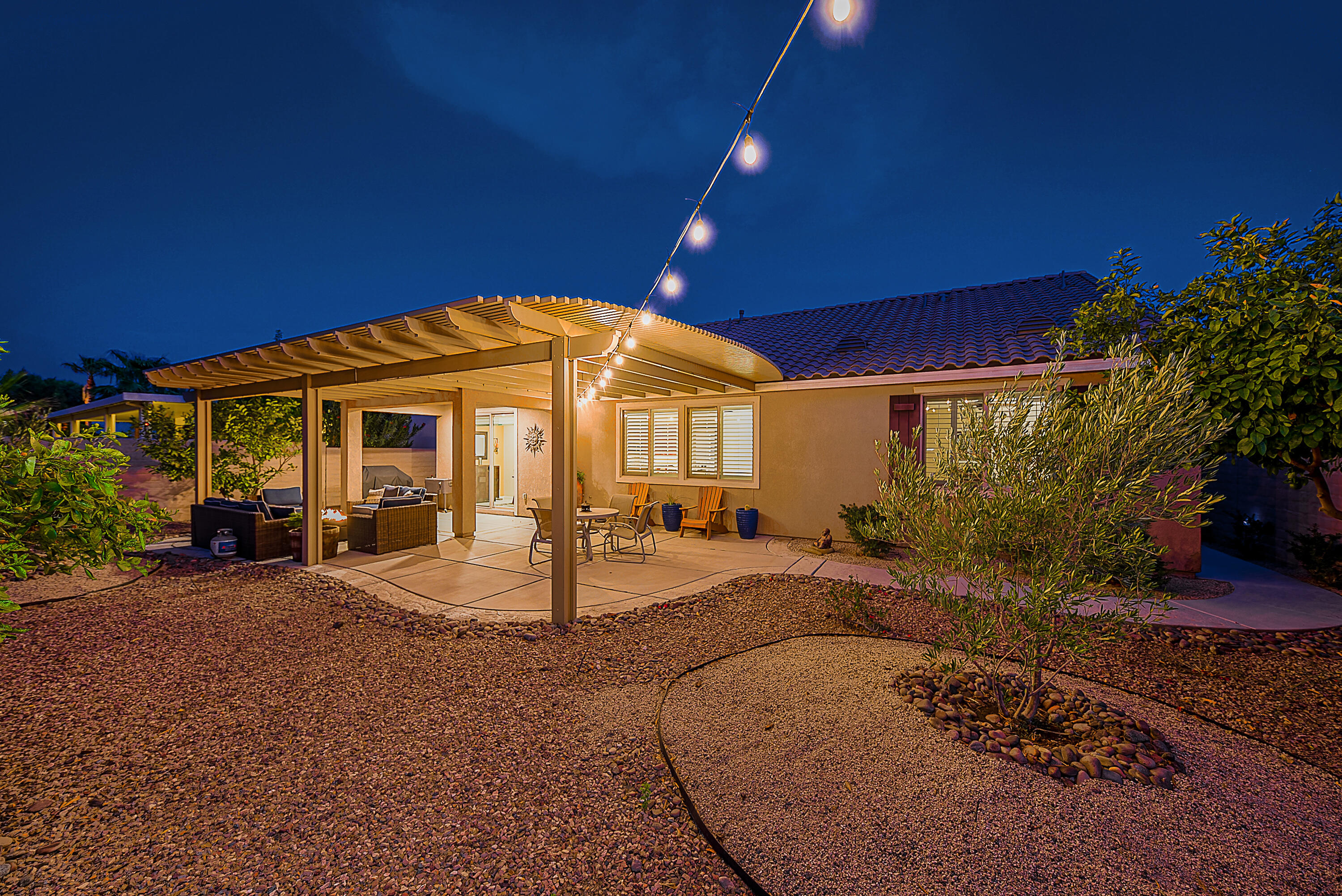 81190 Corte Del Olma Indio, CA 92203 - Photo 2 of 47 a view of a house with backyard porch and sitting area
