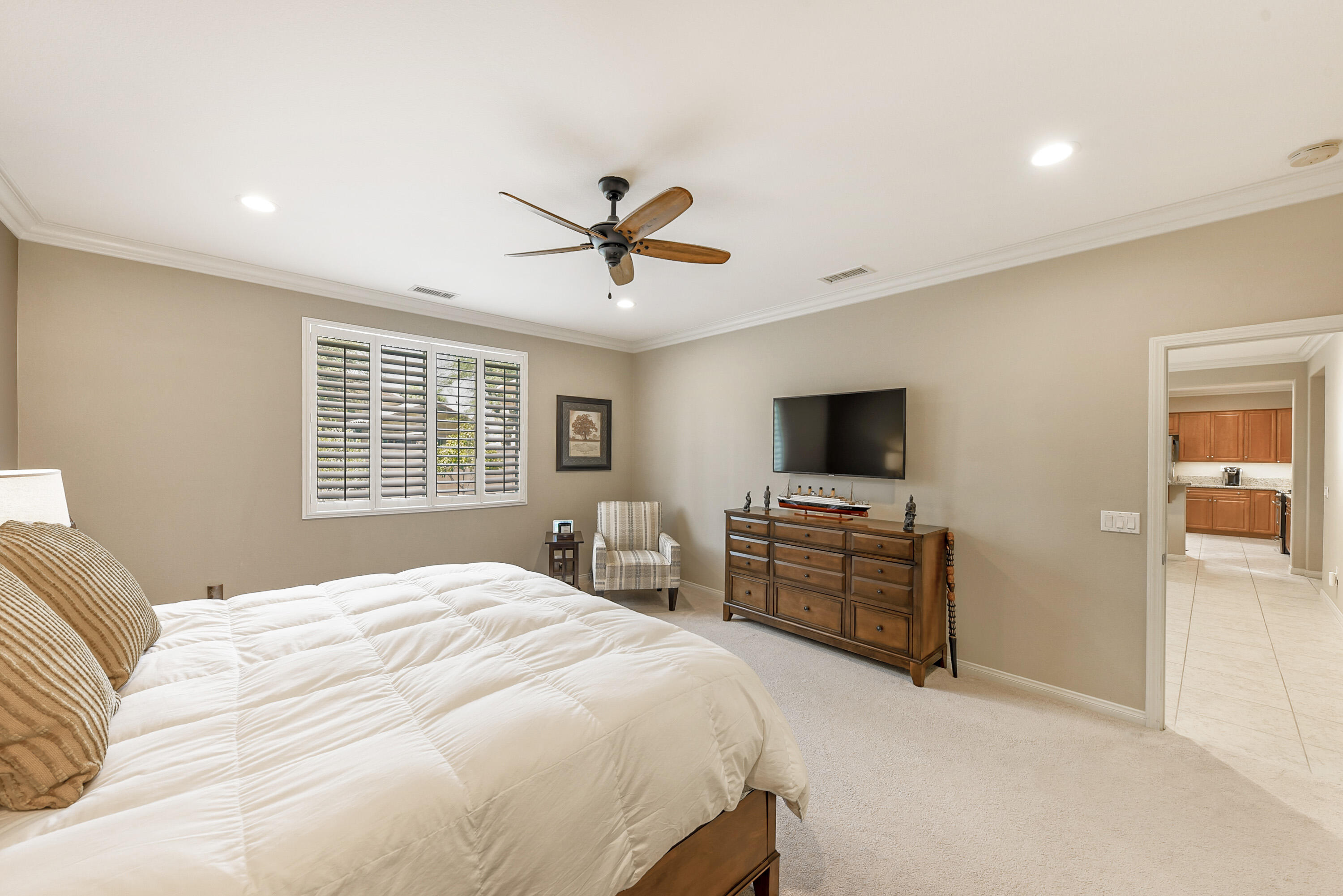 81190 Corte Del Olma Indio, CA 92203 - Photo 21 of 47 a bedroom with a bed and a flat screen tv