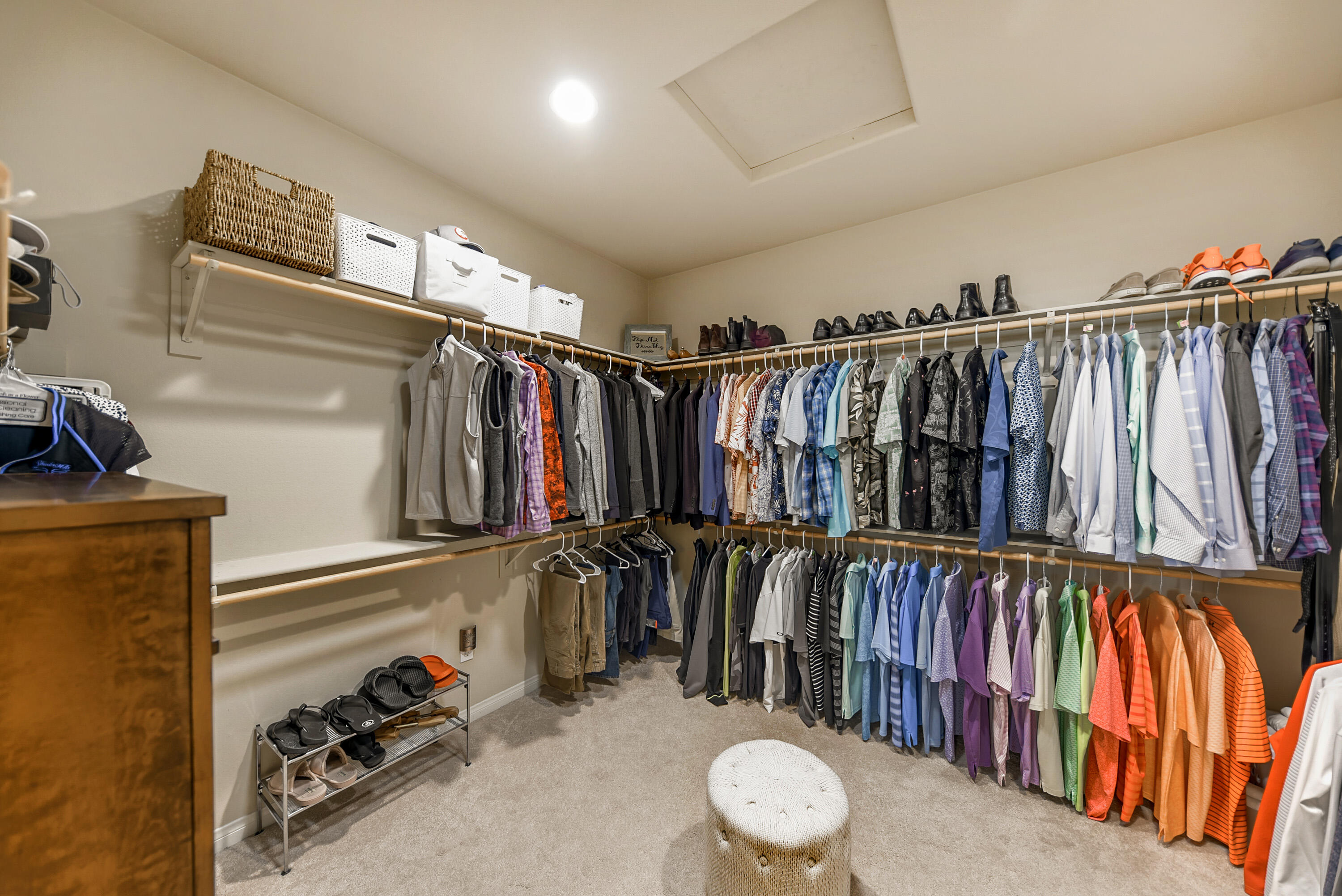 81190 Corte Del Olma Indio, CA 92203 - Photo 24 of 47 a view of walk in closet with clothes and shoes