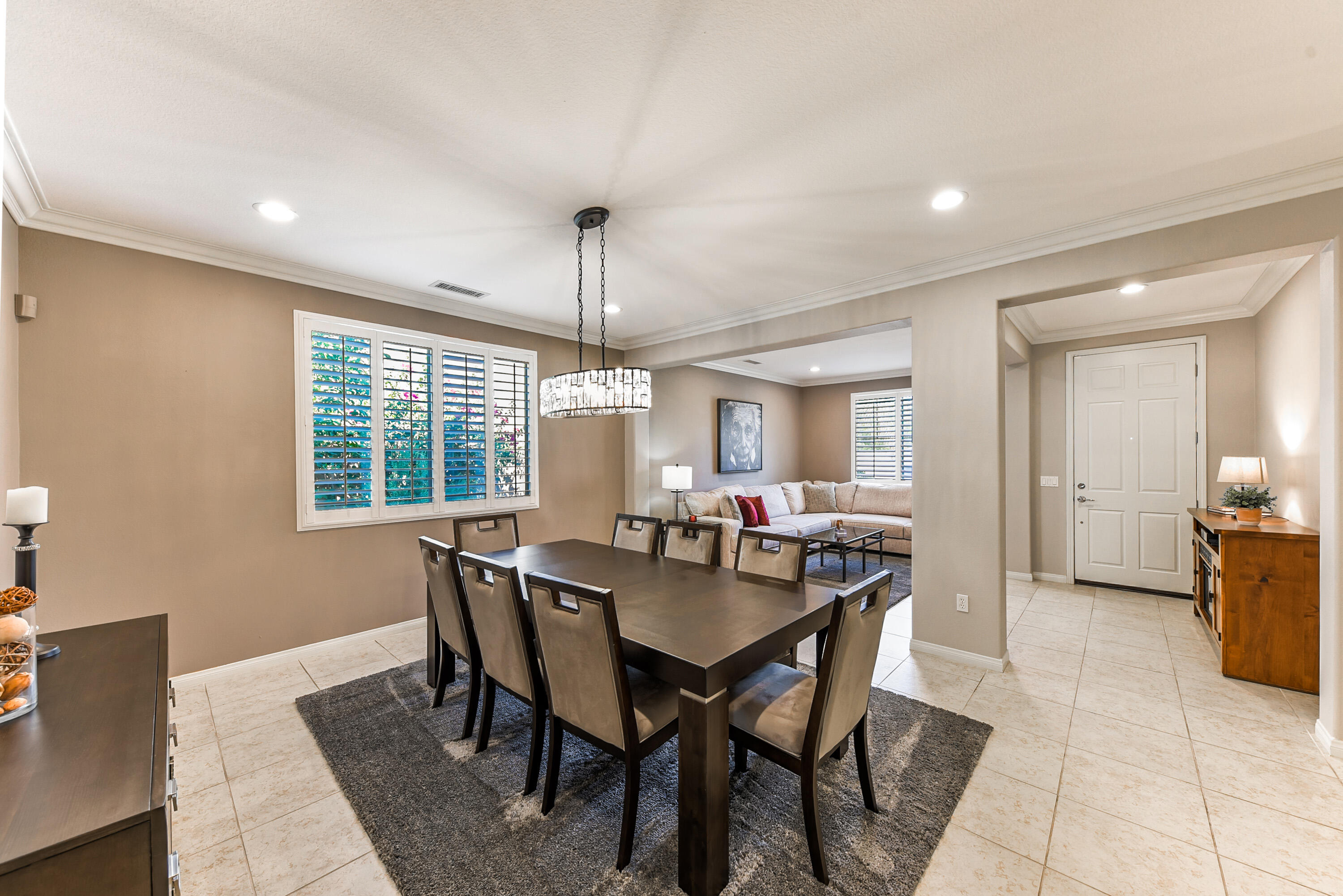 81190 Corte Del Olma Indio, CA 92203 - Photo 6 of 47 a view of a a dining room with furniture window and wooden floor