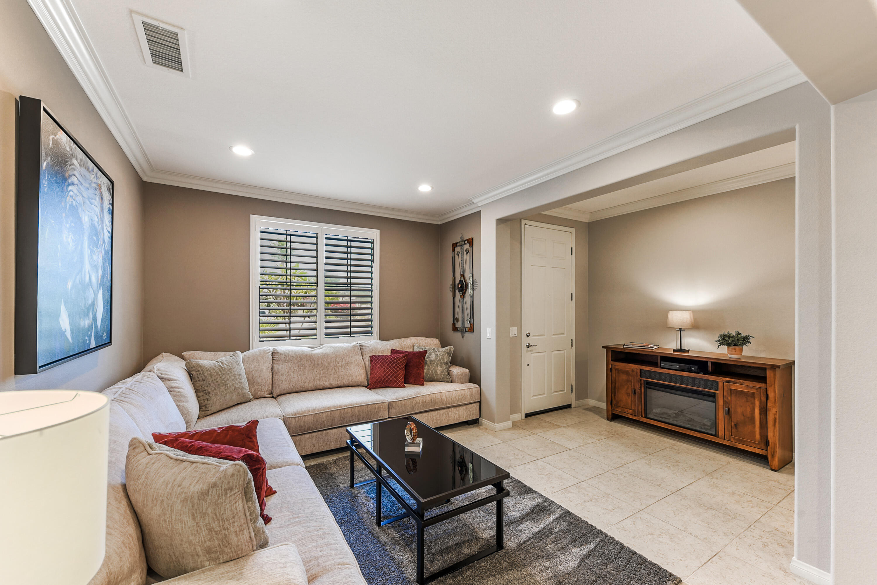 81190 Corte Del Olma Indio, CA 92203 - Photo 8 of 47 a living room with furniture and a large window