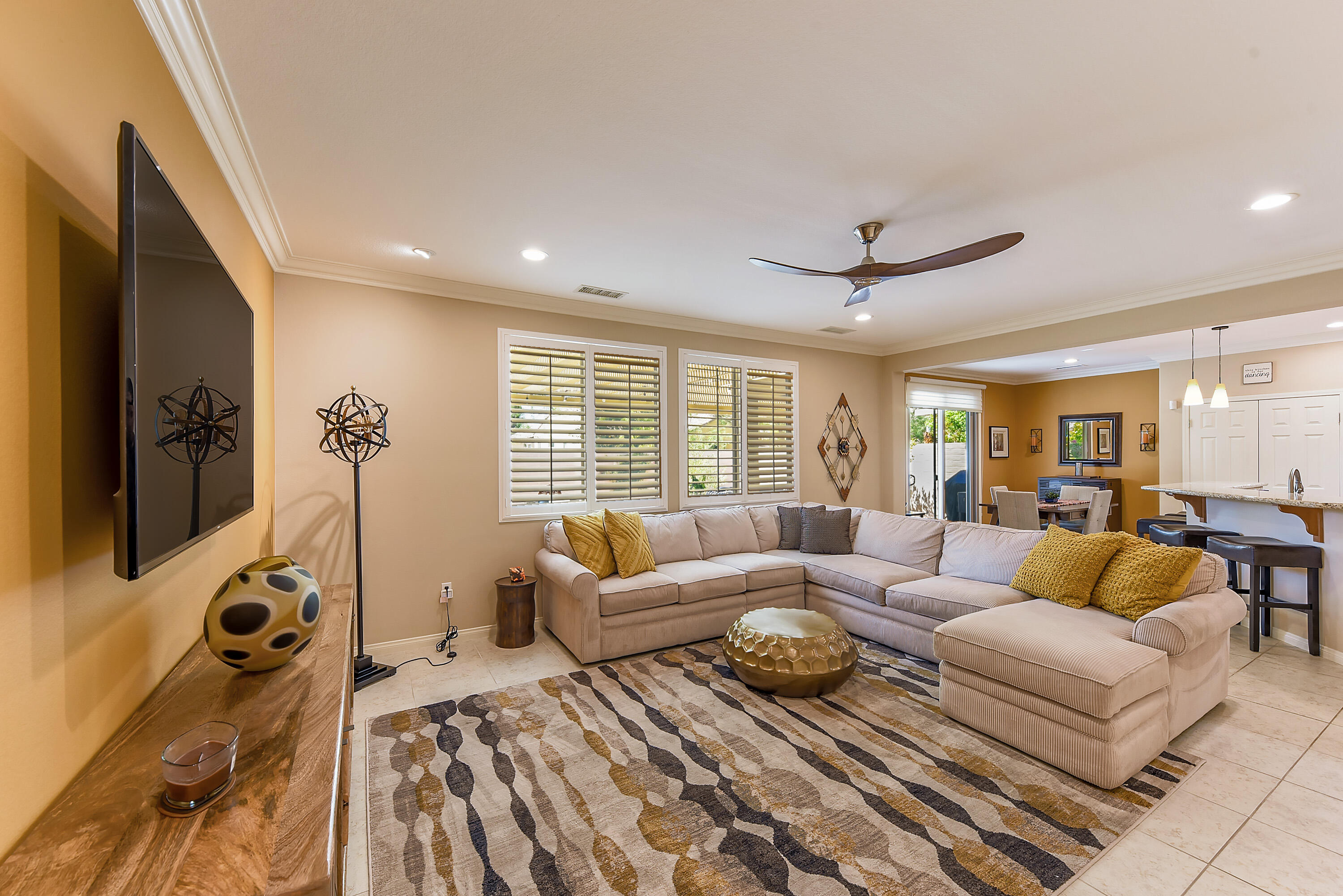 81190 Corte Del Olma Indio, CA 92203 - Photo 10 of 47 a living room with furniture and a flat screen tv
