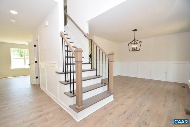 a view of a hallway with windows