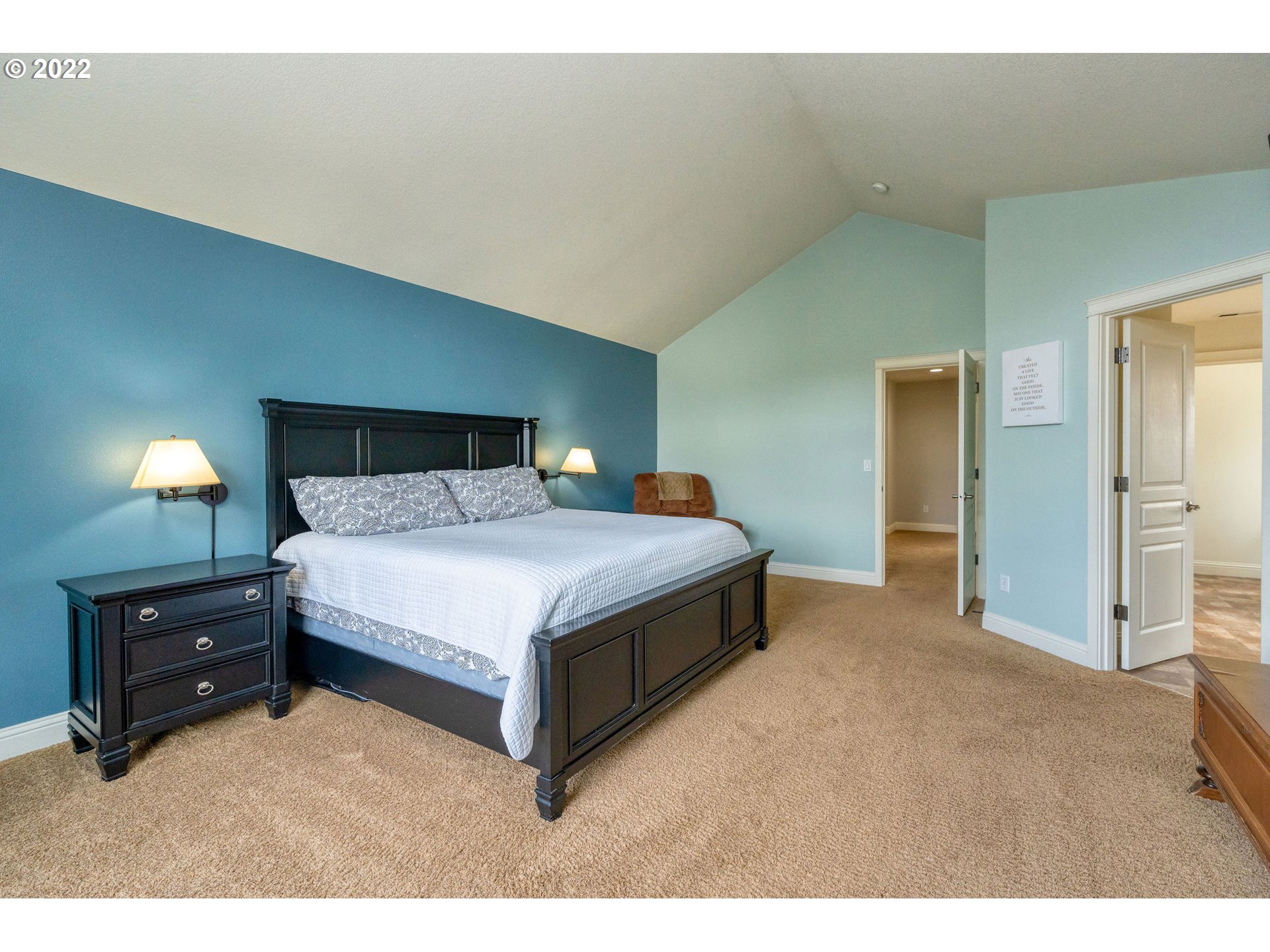 2785 North Fremont Street Cornelius, OR 97113 - Photo 14 of 32 a bedroom with a bed and a lamp