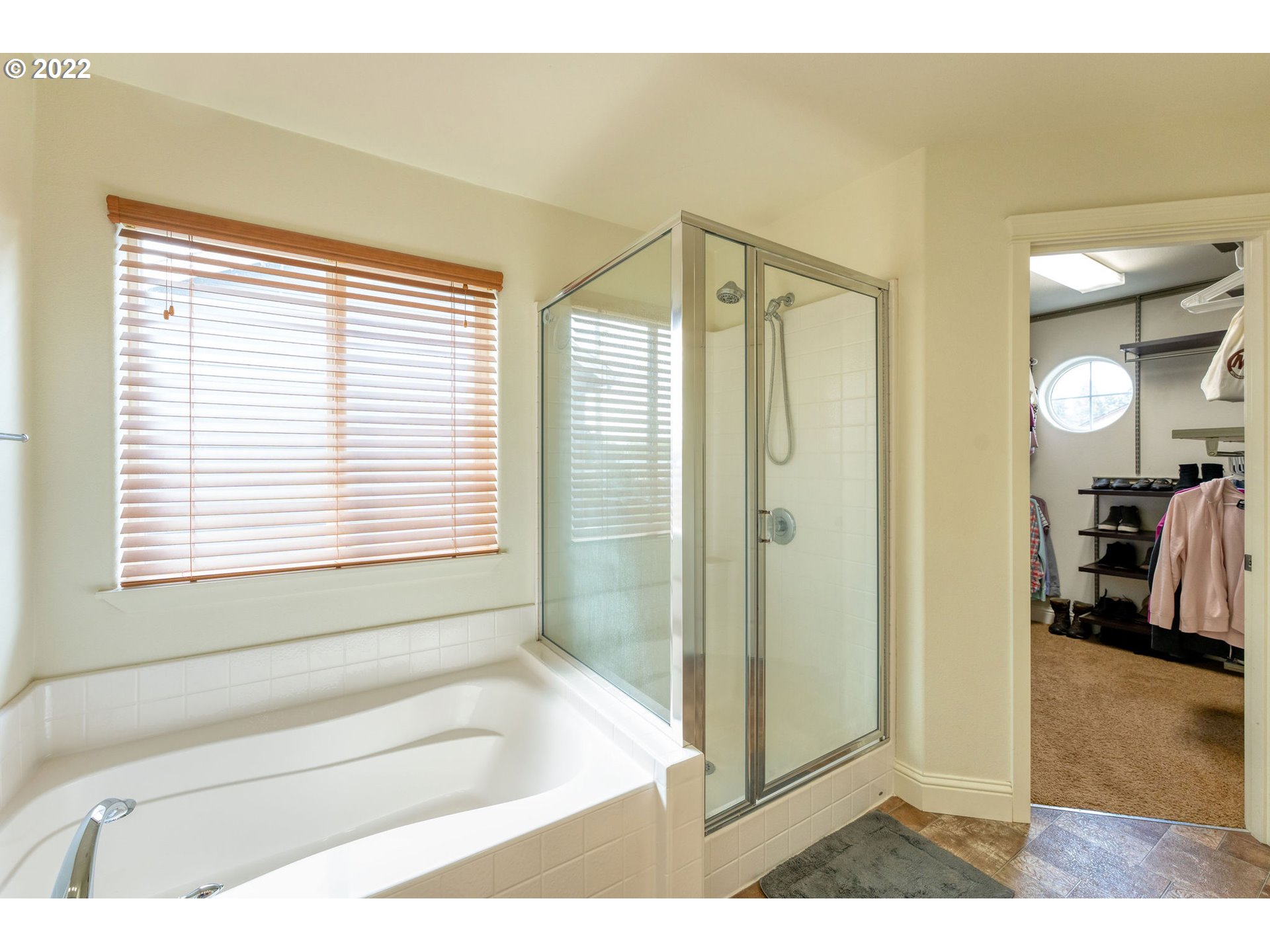 2785 North Fremont Street Cornelius, OR 97113 - Photo 16 of 32 a bathroom with a bathtub and a shower
