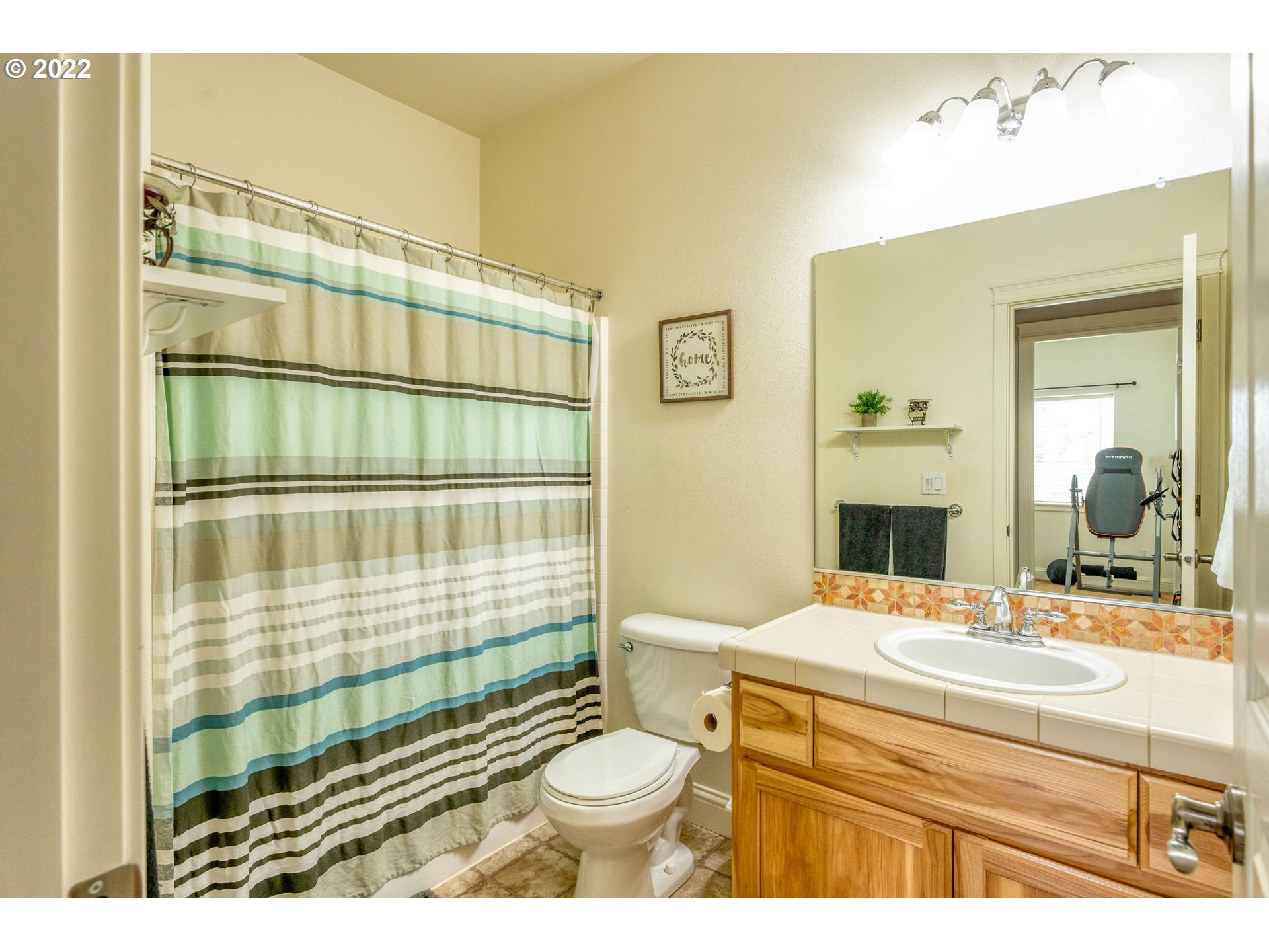 2785 North Fremont Street Cornelius, OR 97113 - Photo 21 of 32 a bathroom with a sink toilet mirror and shower