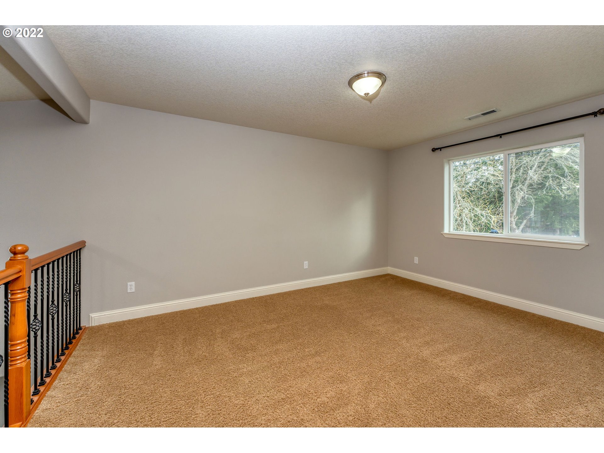 2785 North Fremont Street Cornelius, OR 97113 - Photo 22 of 32 a view of an empty room with a window