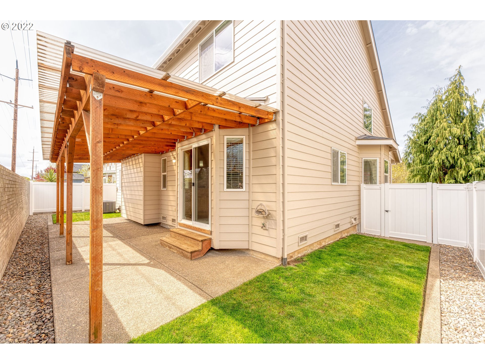 2785 North Fremont Street Cornelius, OR 97113 - Photo 25 of 32 a view of a house with backyard and wooden fence