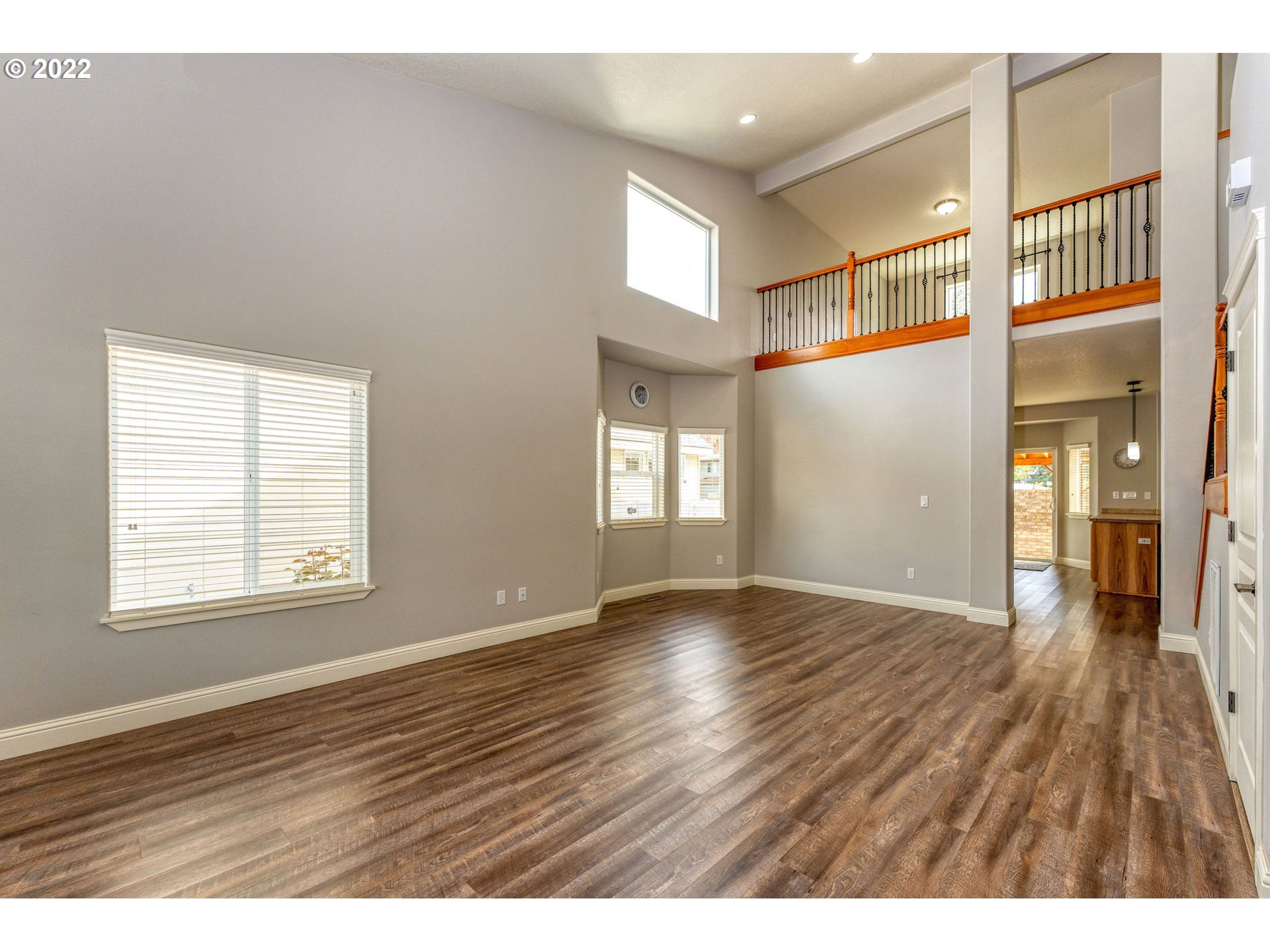 2785 North Fremont Street Cornelius, OR 97113 - Photo 6 of 32 a view of an empty room with wooden floor and a window