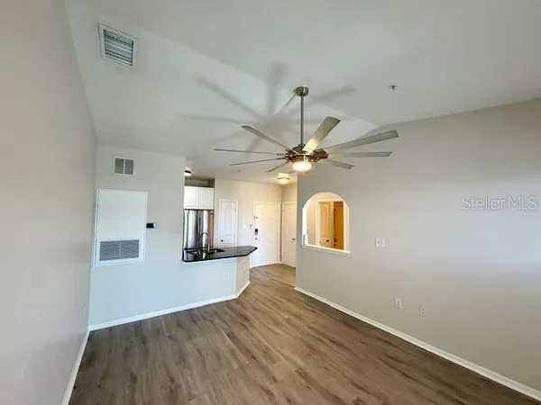a bathroom with a bathtub shower sink and toilet