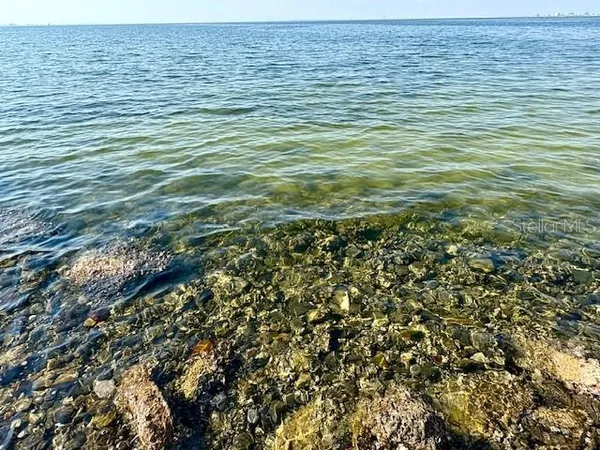 a view of a brick building with many windows