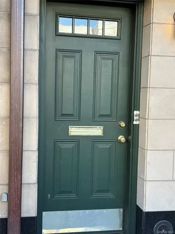 a bathroom with a sink a mirror and a shower