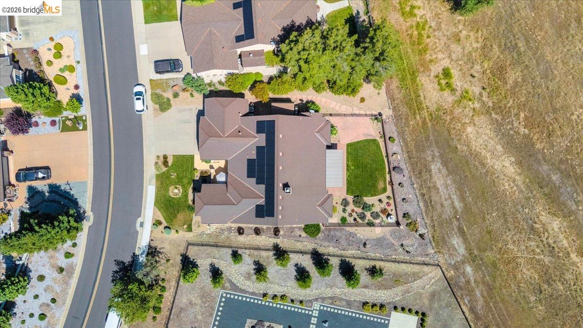 158 Rock Ridge Lane Copperopolis, CA 95228 - Photo 66 of 72 Aerial representation of the property featuring a multi-gabled roofline with solar panels