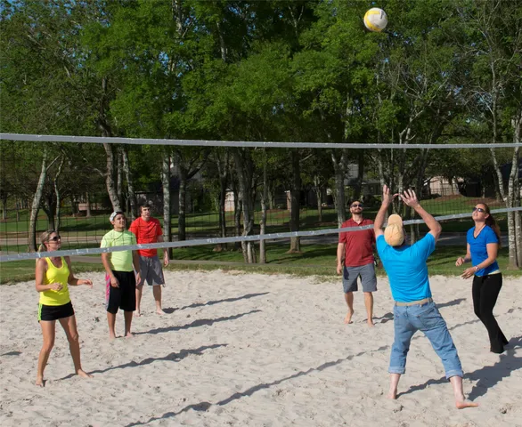 a childrens park with lots of swings and slides