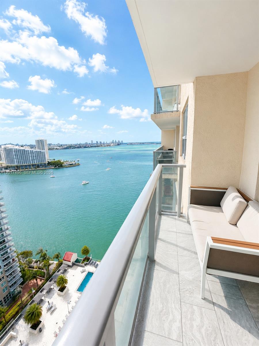 Brickell Miami, FL 33131 - Photo 17 of 19 a terrace with outdoor seating and lake view