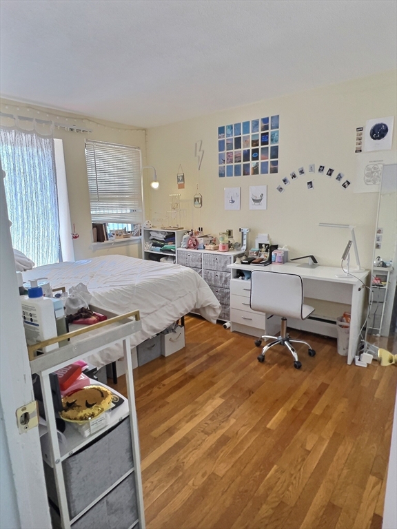 1039 Commonwealth Avenue, Unit 18 Boston, MA 02215 - Photo 5 of 6 a room with furniture pool table and window