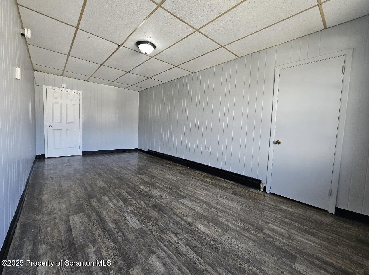 202 Moosic Road Old Forge, PA 18518 - Photo 3 of 8 a view of an empty room with wooden floor
