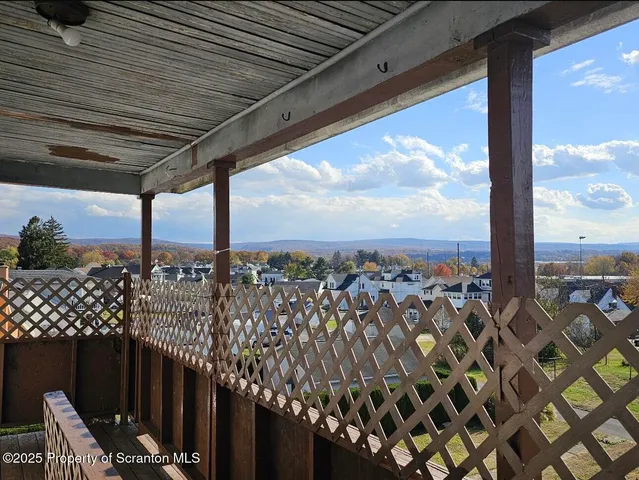 a view of a balcony with city view