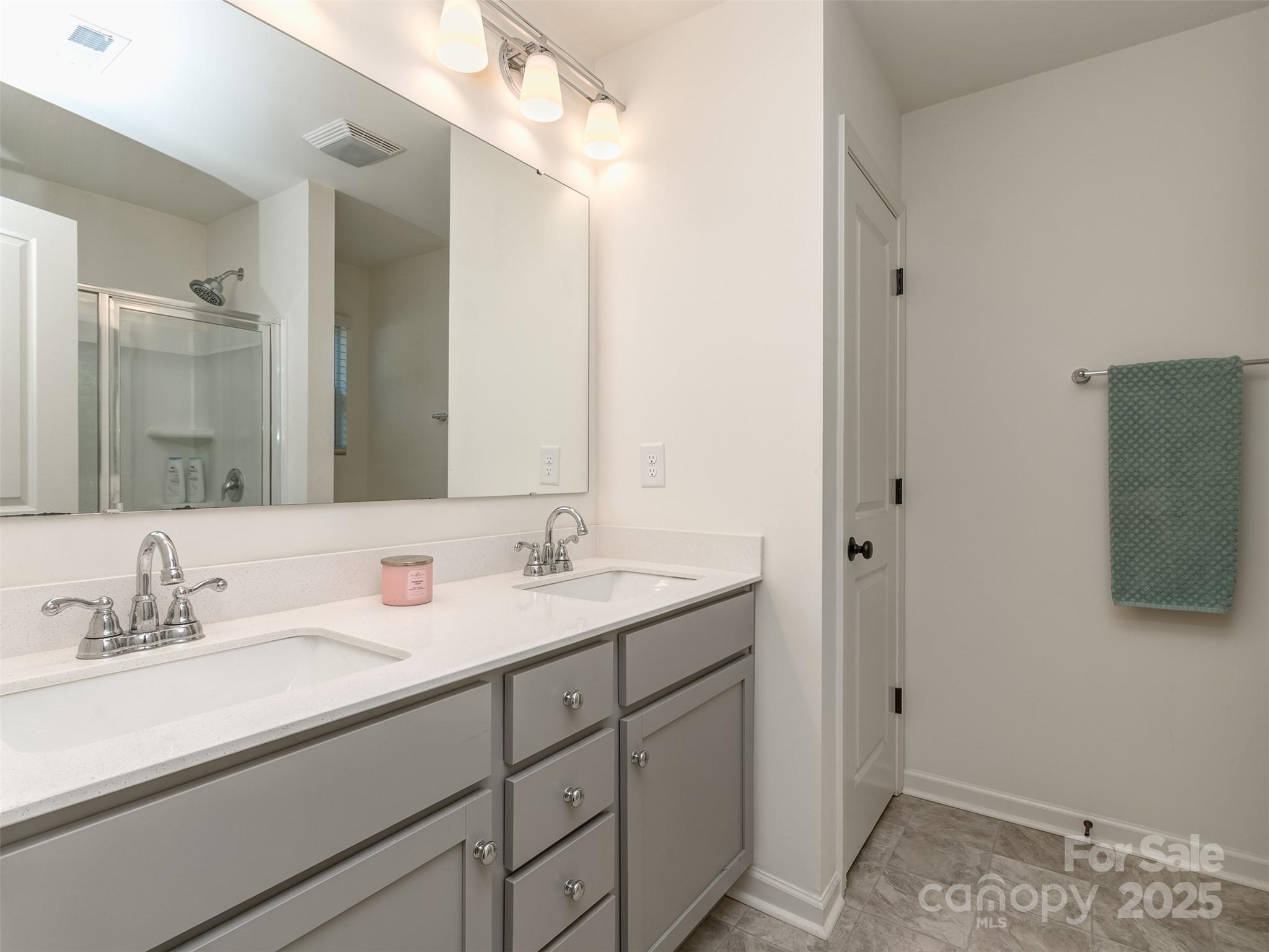 2024 Crooked Oak Lane York, SC 29745 - Photo 15 of 25 a bathroom with a sink and a mirror