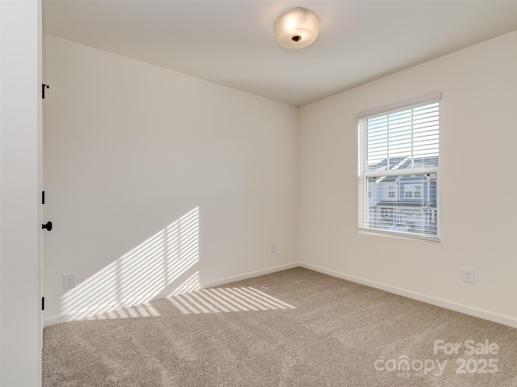 2024 Crooked Oak Lane York, SC 29745 - Photo 18 of 25 a view of an empty room with a window